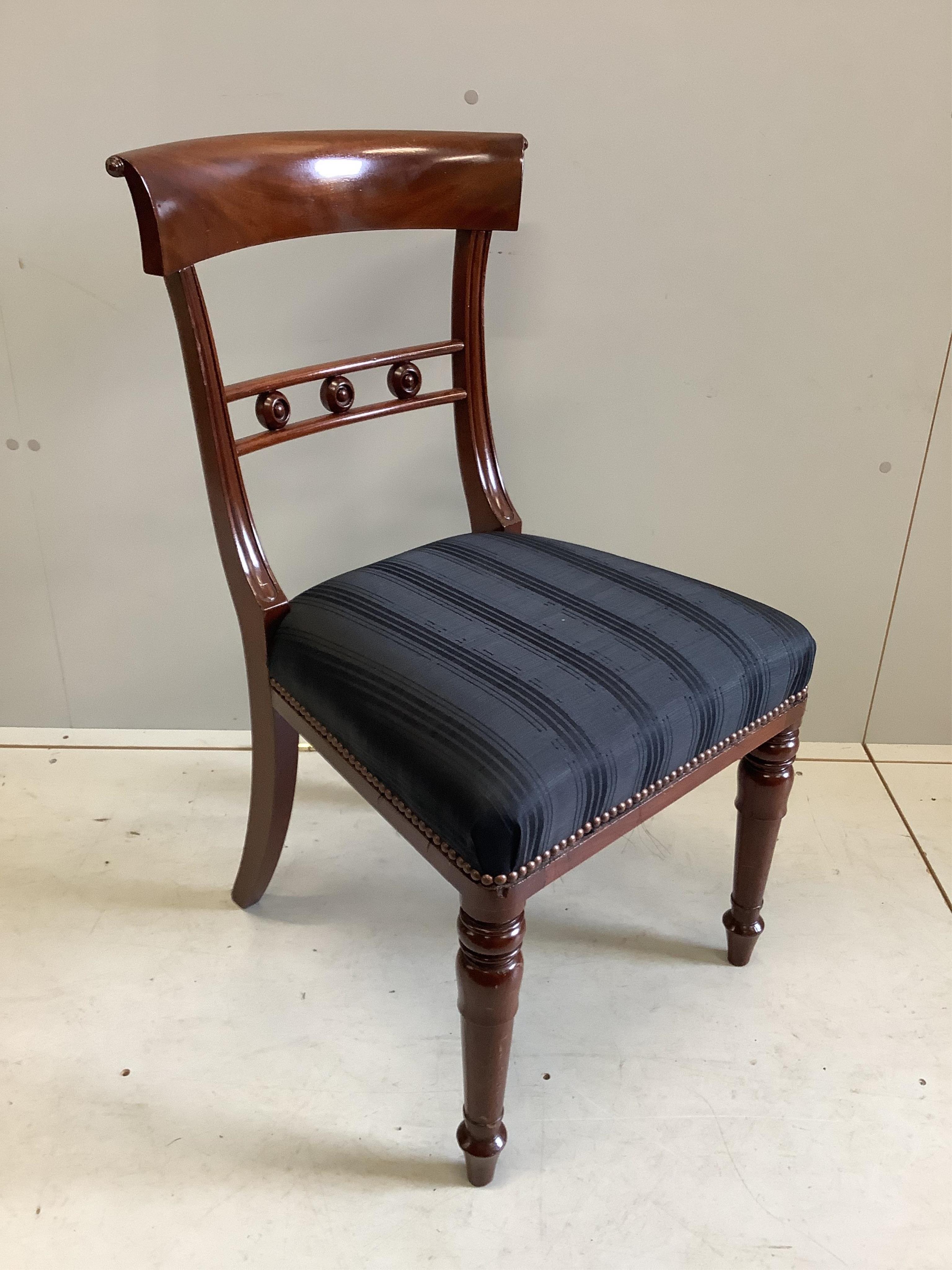 A set of twelve Regency style mahogany dining chairs, width 48cm, depth 45cm, height 88cm. Condition - fair to good